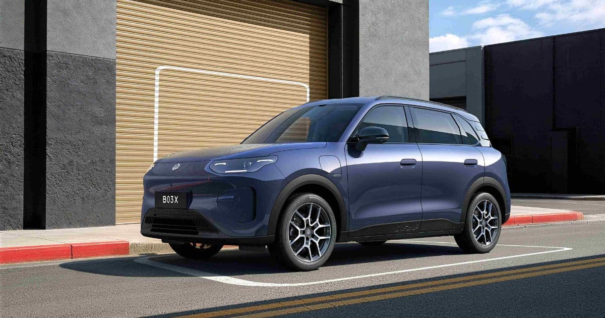Blue Leapmotor B03X Electric SUV Parked by a Garage Door